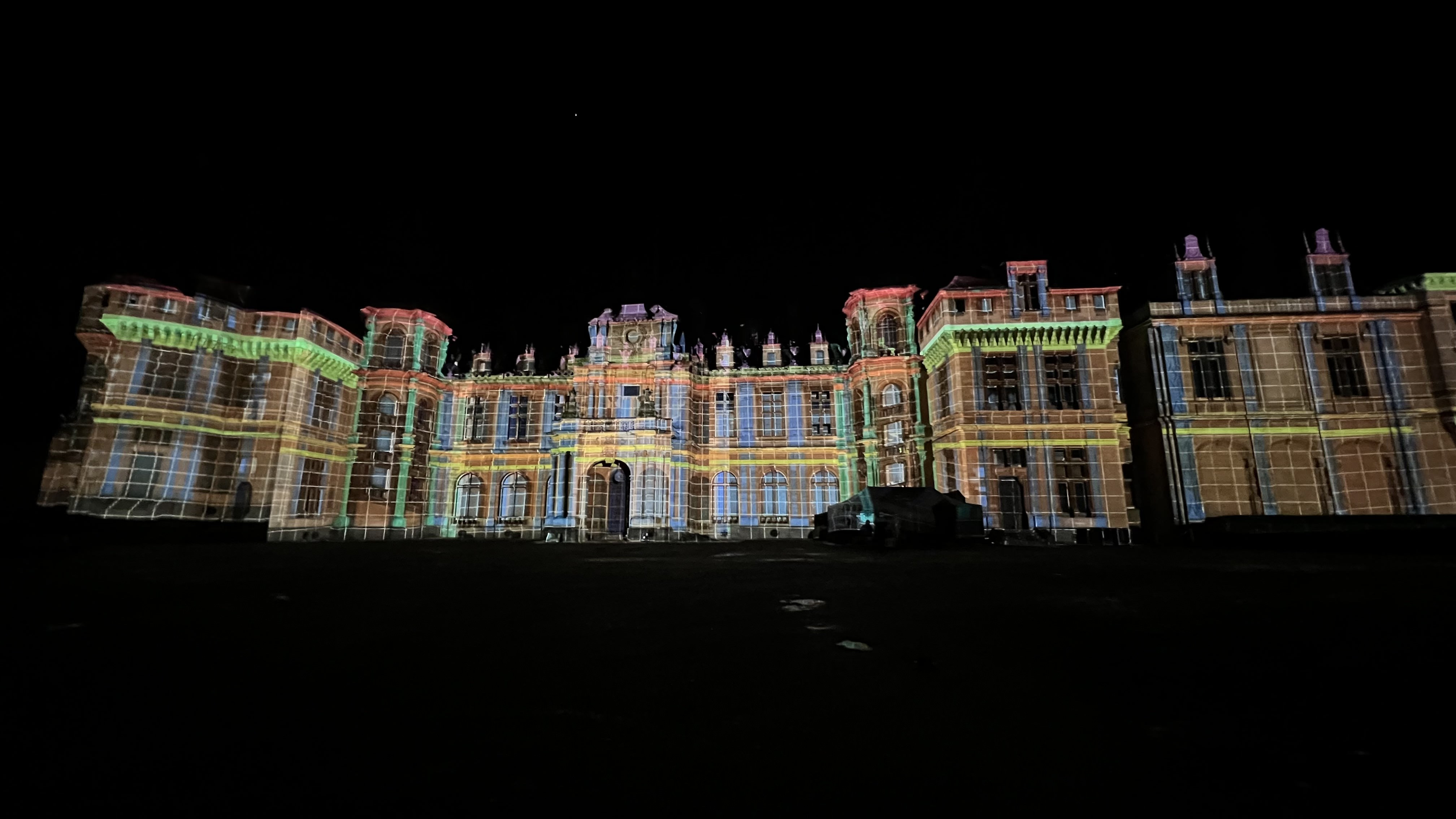 Photo of Waddesdon Manor with a image mapping grid projected on it.
Photo taken by Stuart Burdett