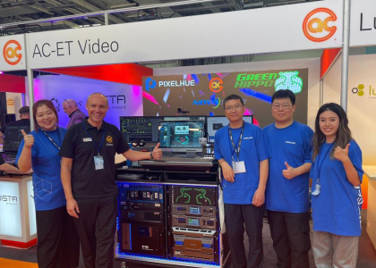 Stuart Burdett of AC-ET pictured with the PIXELHUE team at their stand at PLASA 2023